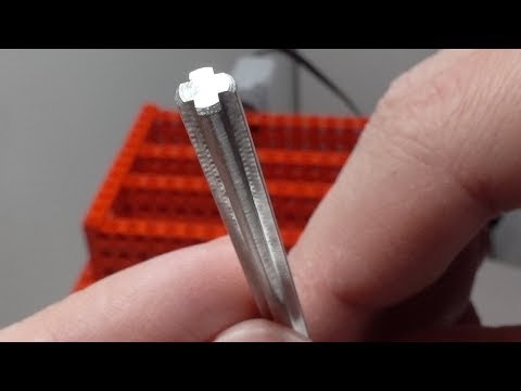Examining the Compatibility of a Steel Axle with Lego Bricks